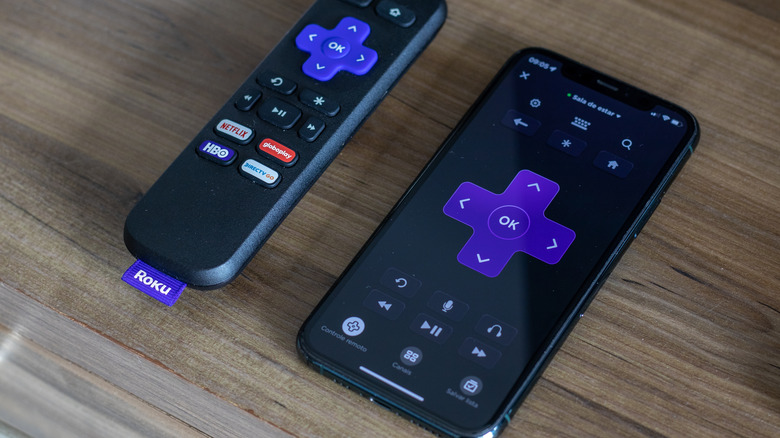 Roku mobile app next to a physical remote control.