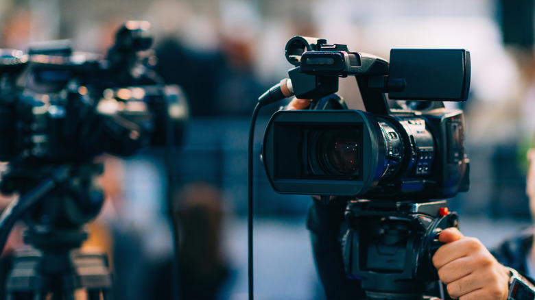 A professional video camera used in a production setting