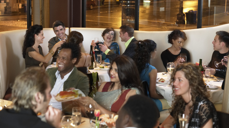 A restaurant busy with patrons.