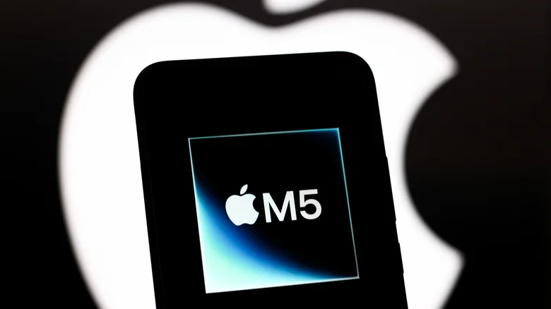 The Apple M5 chip logo graphic displayed on an iPhone silhouette.