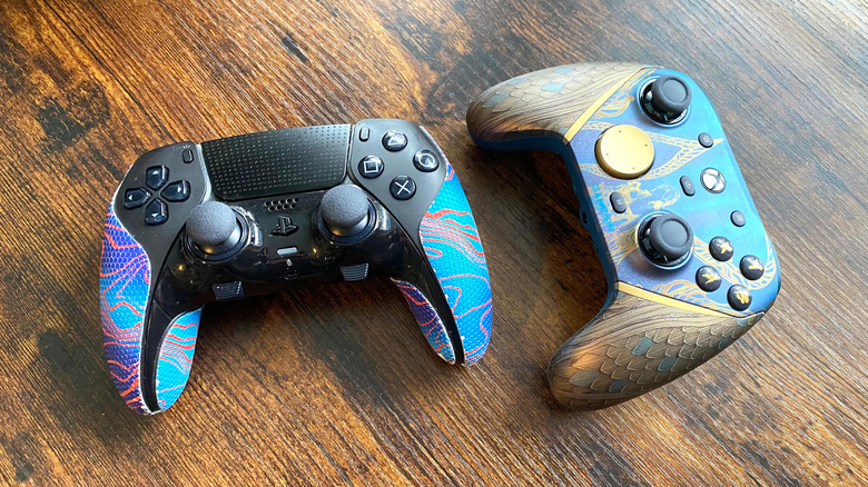 A DualSense Edge controller next to an Xbox GameSir G7 Pro controller.