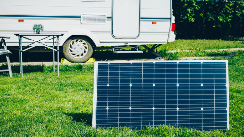 Image of a camper van with solar panel.