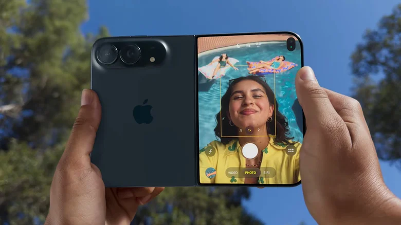 Taking a pool selfie with friends using the iPhone Duo's rear cameras.