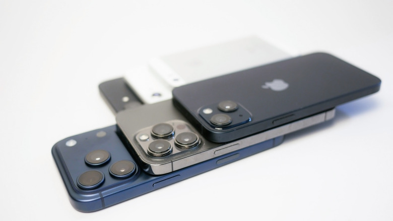 iPhone models of various generations stacked on each other