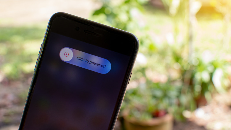 The slider to turn off an iPhone shown on its screen