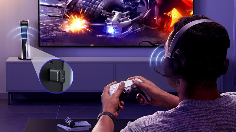 UGREEN USB-C Bluetooth adapter connected to a PS5