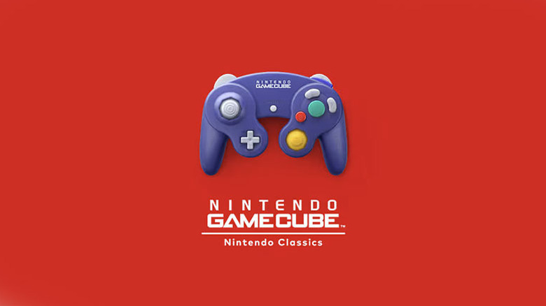 An indigo GameCube controller sits on a red background.
