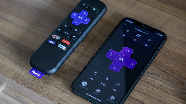 The Roku remote next tot he Roku app's virtual remote