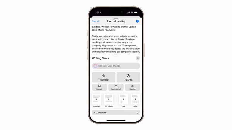 An iPhone with Writing Tools showing beneath a body of text.