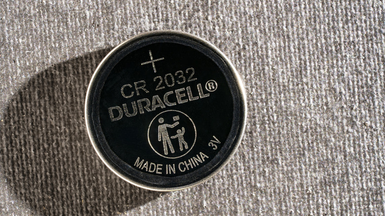 A Duracell CR2032 battery.