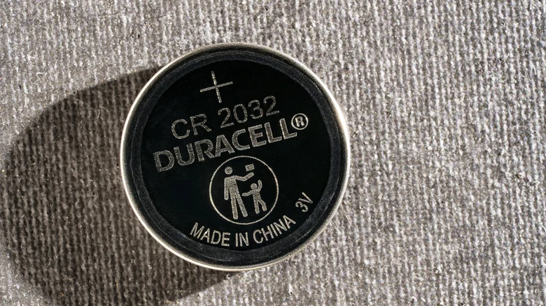 A Duracell CR2032 battery.