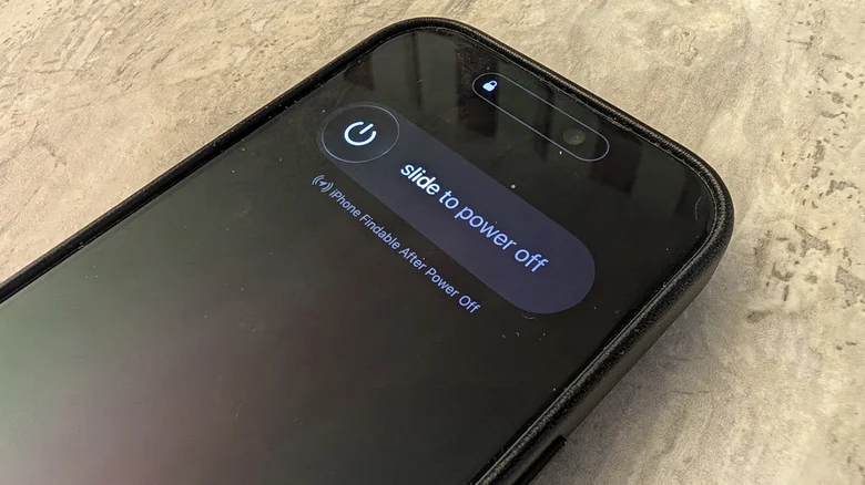 An iPhone showing the "slide to power off" menu.