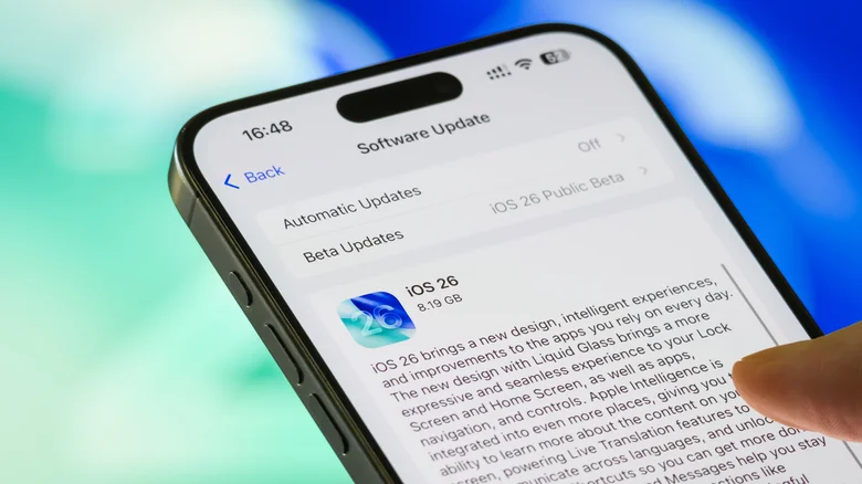An iPhone showing the iOS 26 update page.