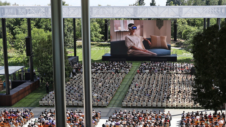 Developers watching a presentation at Apple's developer conference in 2024.