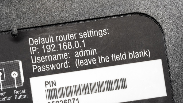 A sticker on a router with the default IP address, username and password.