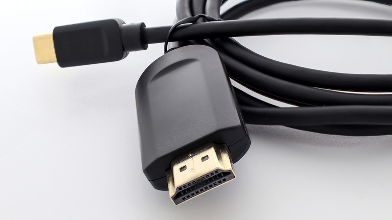 A black USB-C to HDMI cable shown close-up against a white background.