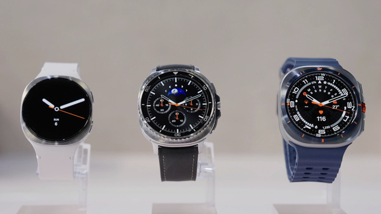 Three Galaxy Watches on clear displays