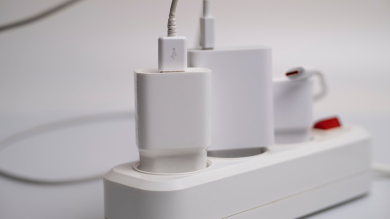 Chargers plugged into a power strip