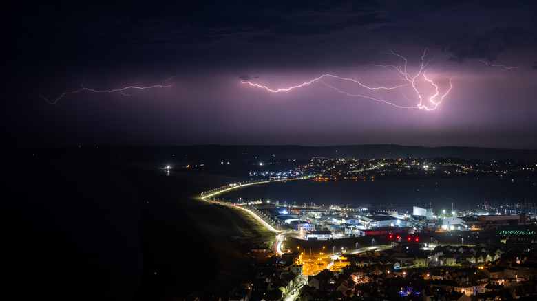 Lightning storm above city