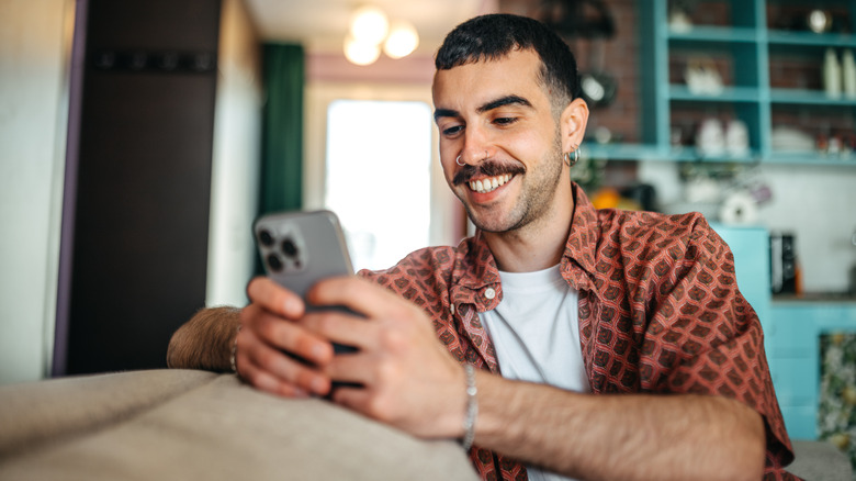 Image of person texting.