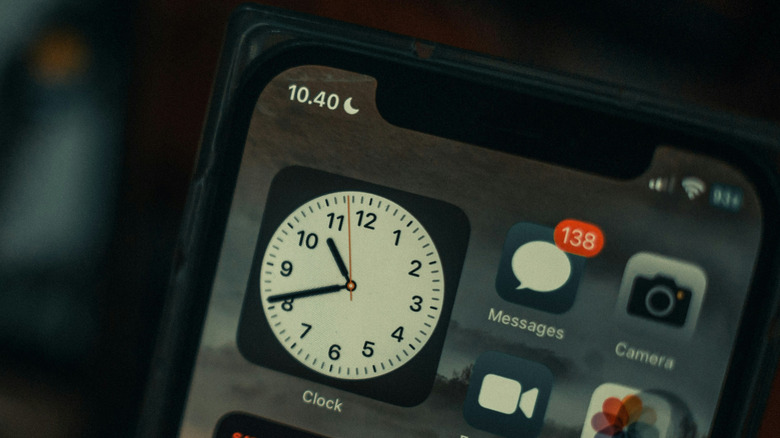 An iPhone screen showing a large clock widget