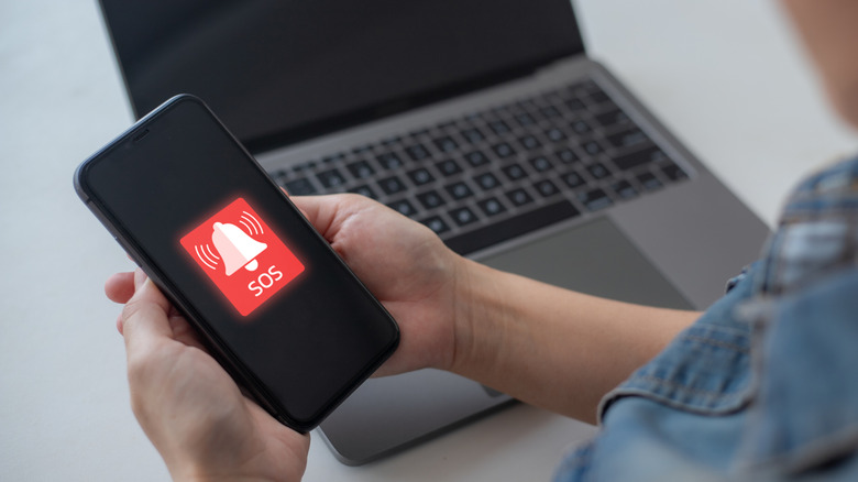 "SOS" warning showing on a smartphone
