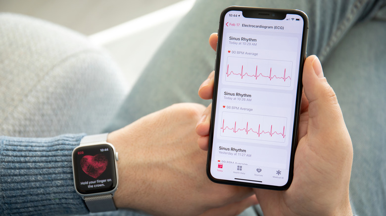 Person checking ECG on their iPhone and Apple Watch