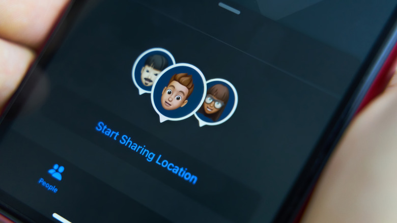A close-up of an iPhone screen showing sharing location with people.