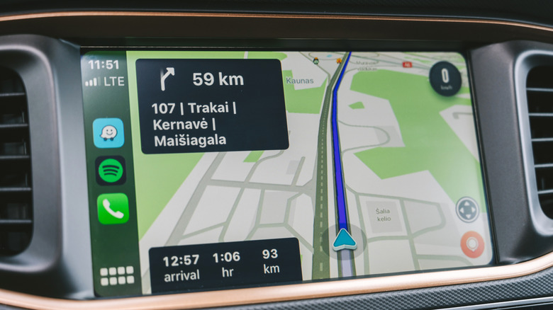 Navigation directions in Waze on a CarPlay screen