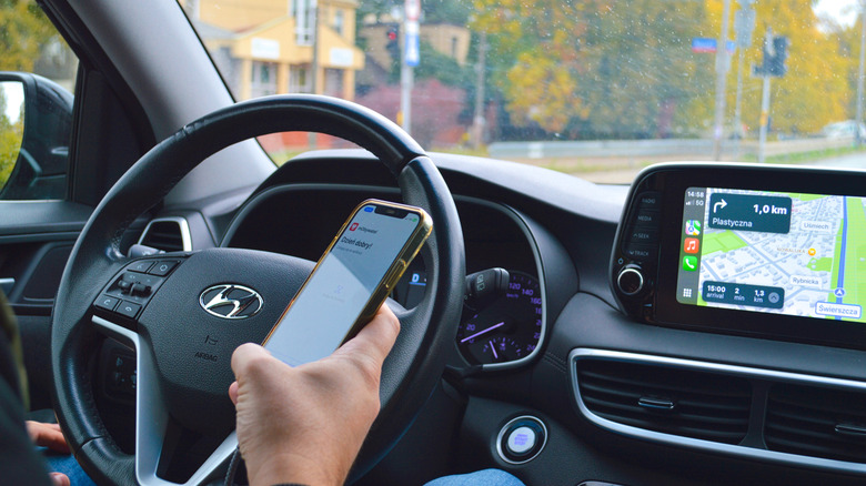Holding iPhone while in Hyundai car