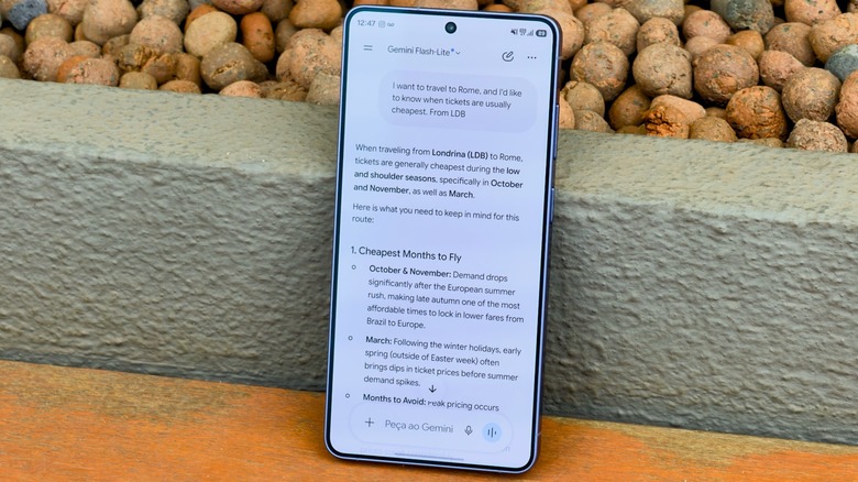 Gemini on a smartphone showing flight suggestions for a trip.