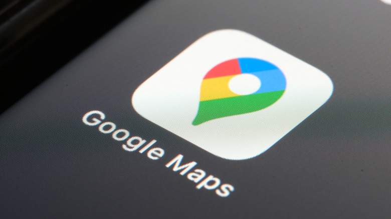 A close-up of the Google Maps app icon on a phone.