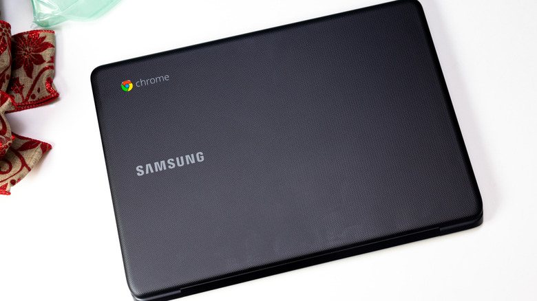 An older Chromebook on table.