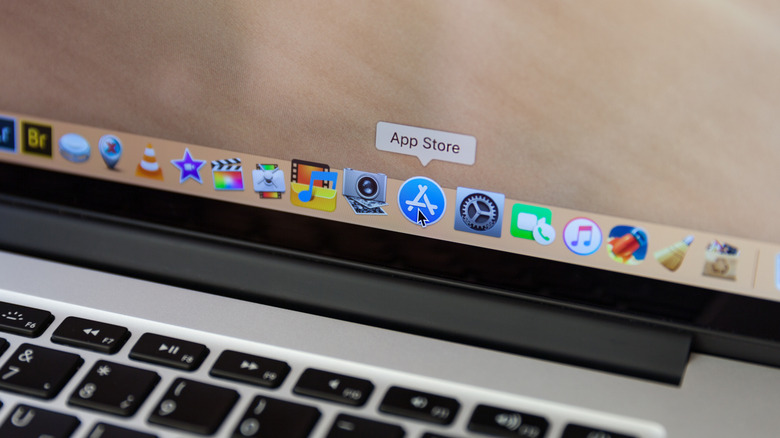 A Mac with the mouse highlighting the App Store icon in the Dock.