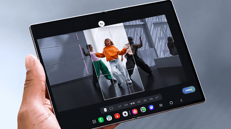 Samsung Galaxy Z Fold8 showing My FanCam in action, with a vertical crop tracking one dancer in a group video and a Follow button on screen.