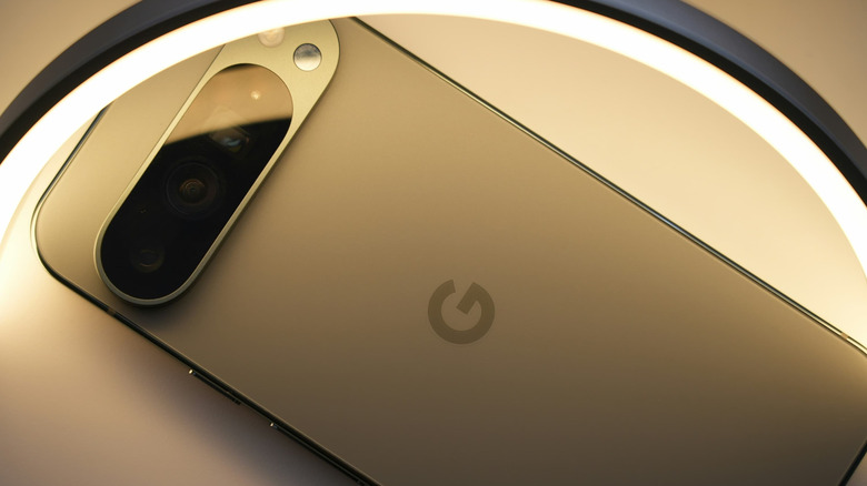 Google Pixel 10 Pro smartphone illuminated under LED ring light