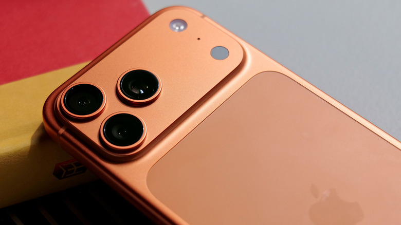 The back of an orange iPhone 17 Pro.