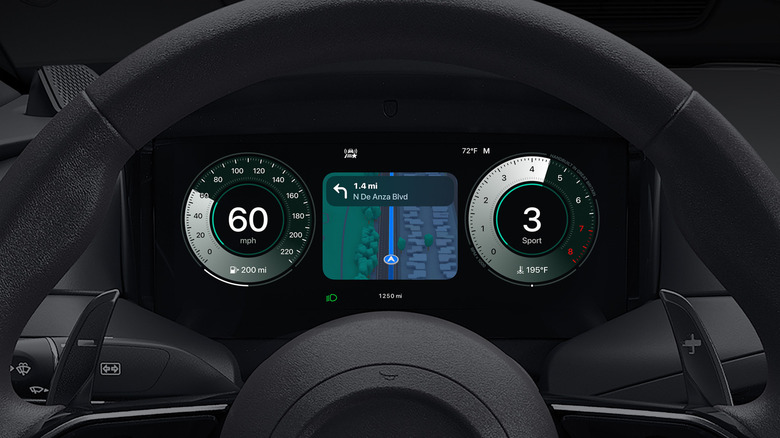 A black car dashboard shows Apple Maps between the car's speedometer and the tachometer.