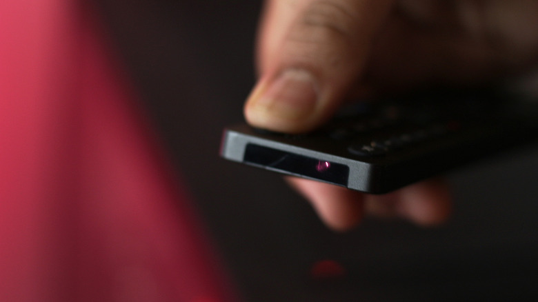 A remote control emitting IR light