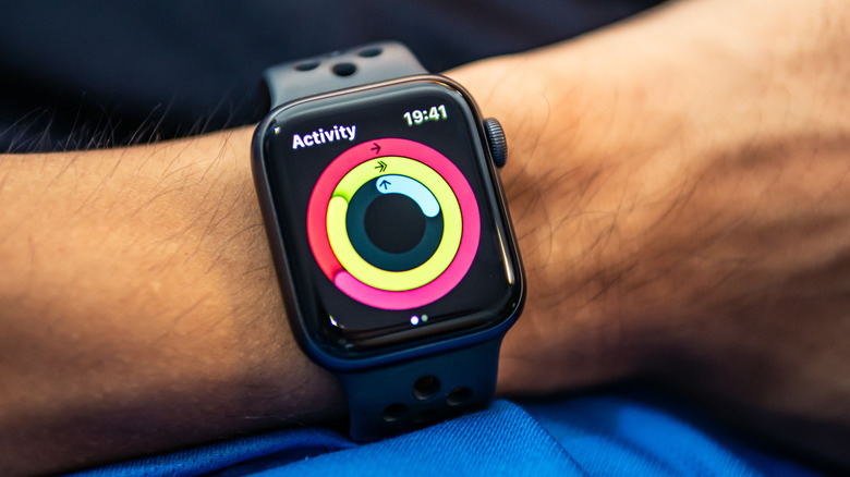 Closeup view of the Fitness app displaying Activity circles on an Apple Watch.