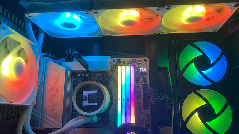 A NZXT liquid CPU cooler with colored fans around it.