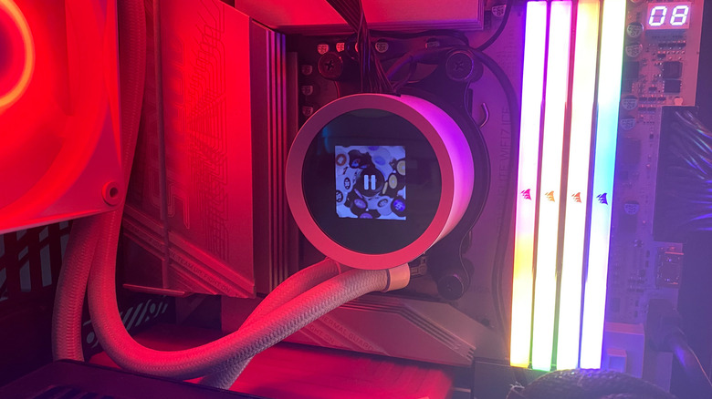 A NZXT liquid CPU cooler next to RGB RAM.
