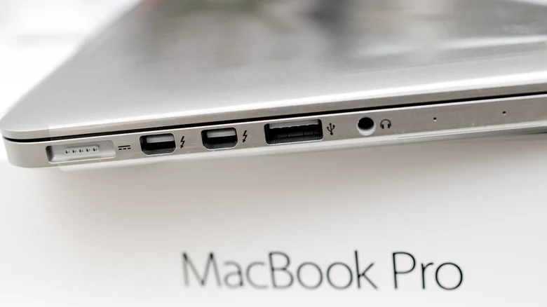 Side view of an older MacBook pro, showing Thunderbolt Mini DisplayPort ports alongside other ports.