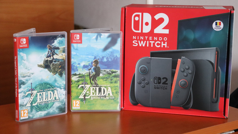Zelda: Breath of the Wild and Tears of the Kingdom with a Nintendo Switch 2 box