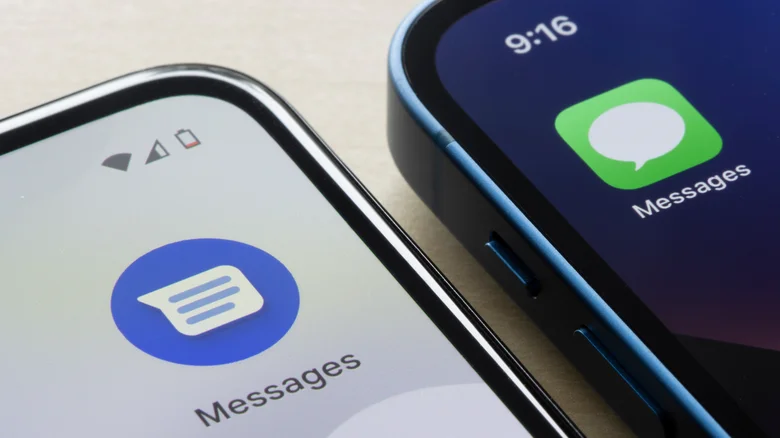Close-up of two smartphones displaying the Google Messages and Apple Messages app icons side by side.