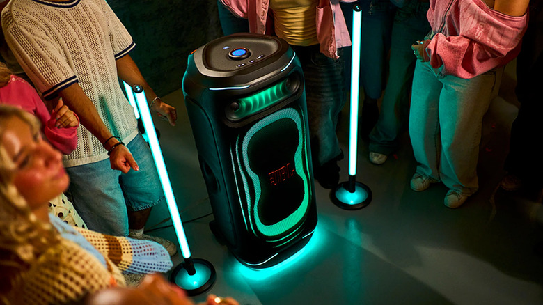JBL's PartyBox Ultimate 2 shown from the front in a party setting