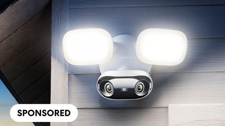 Security camera with lights on a house