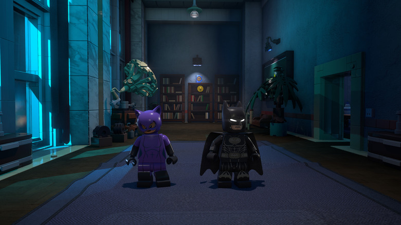 Lego Batman and Lego Catwoman infiltrate somewhere in Lego Gotham