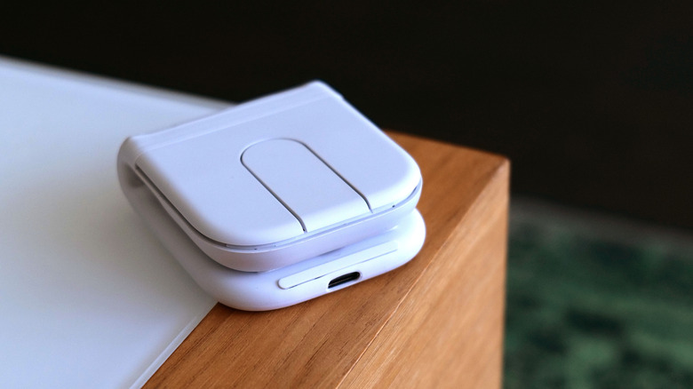Logitech Mobi Fold travel mouse bent in half.