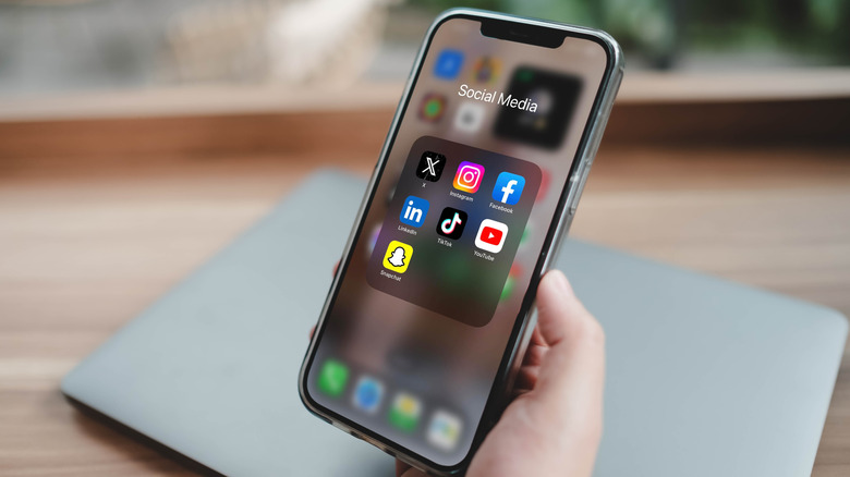 A phone with social media apps.